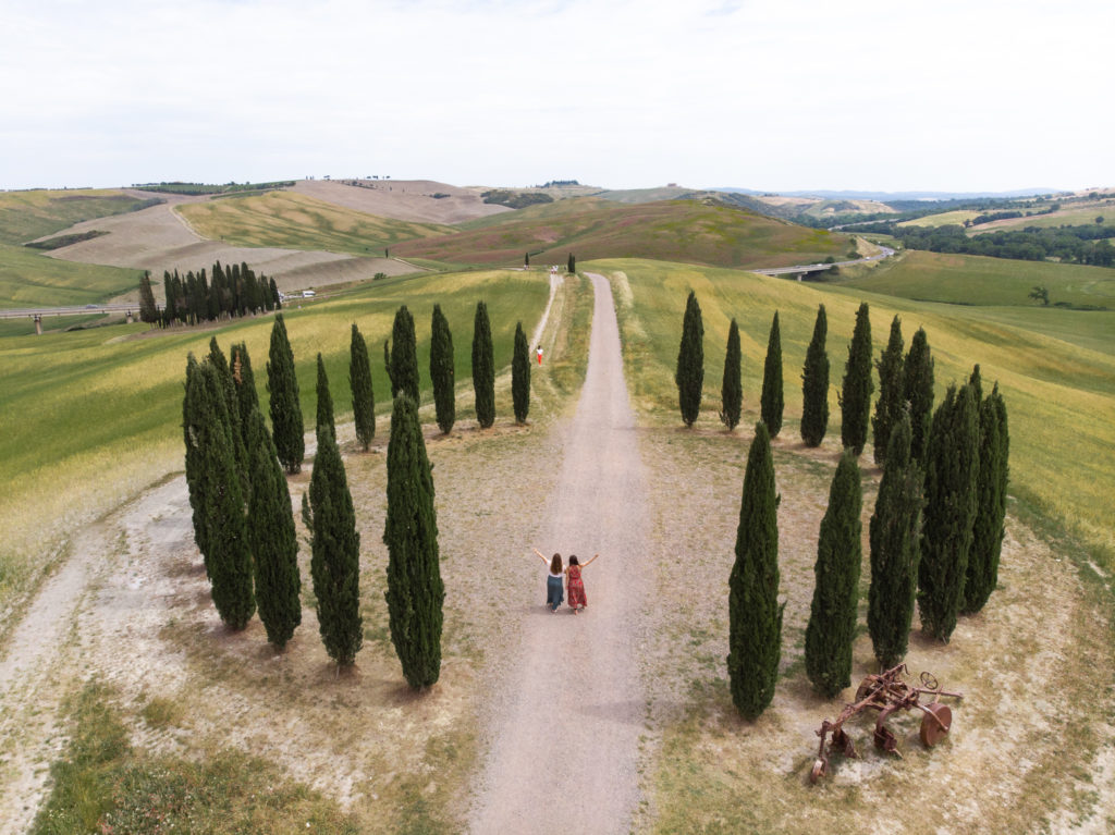 tuscany travel guide: drone shot of a cypress circle in val d'Orcia