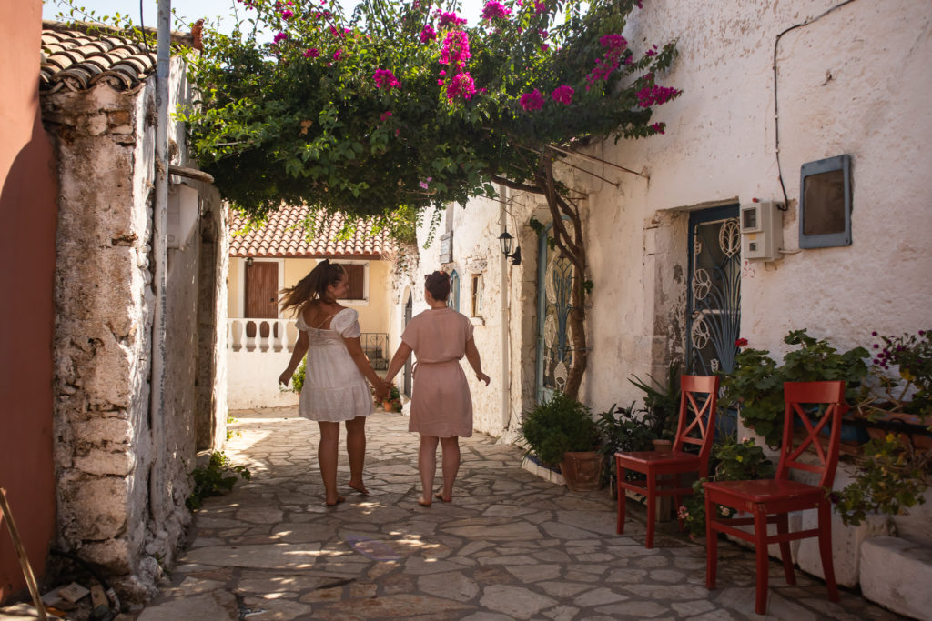 Corfu Greece Travel Guide: Afionas best friends walking through the beautiful alleys